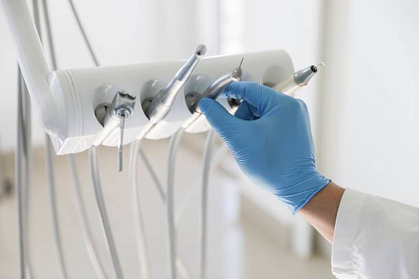 Professional Emergency Dentist technician working in St. Peter, WI